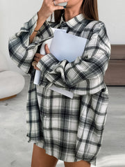 Button-up long sleeve cotton shirt in black and white plaid, with a casual chic style.