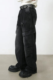 Faded black denim cargo pants with multiple pockets and a relaxed fit.