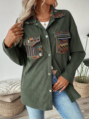 Army green corduroy overshirt with embroidered statement pockets and collar detail.