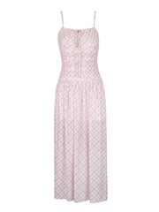 Ruched tied maxi dress in pink and white plaid, with spaghetti straps and a sweetheart neckline.