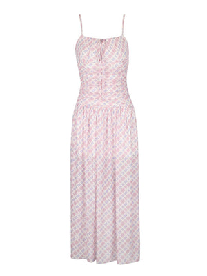 Ruched tied maxi dress in pink and white plaid, with spaghetti straps and a sweetheart neckline.