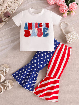 Patriotic toddler two-piece set with white tee and "American Babe" applique, star-print and striped bell-bottom pants.