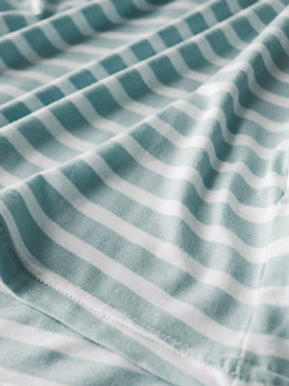 Striped built-in bra tee in turquoise and white, soft fabric detail