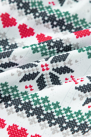 White cotton pajama set with festive red heart and Christmas tree pattern.