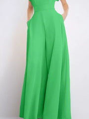 Neon green wide-leg romper with pockets and notched detail.