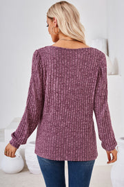 Puffed sleeve ribbed square neck top in red-violet with a textured knit.