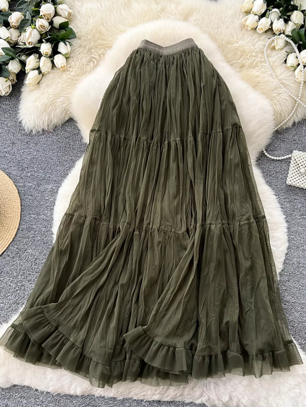Elegant tiered tulle maxi skirt in army green with ruffled hem and lining.