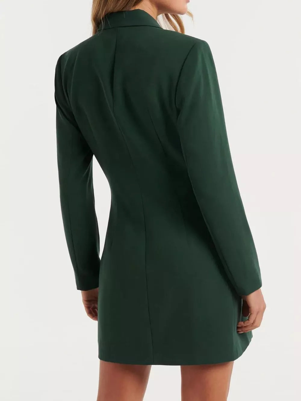 Dark green tailored double-breasted blazer dress with buttoned front and notched lapels.