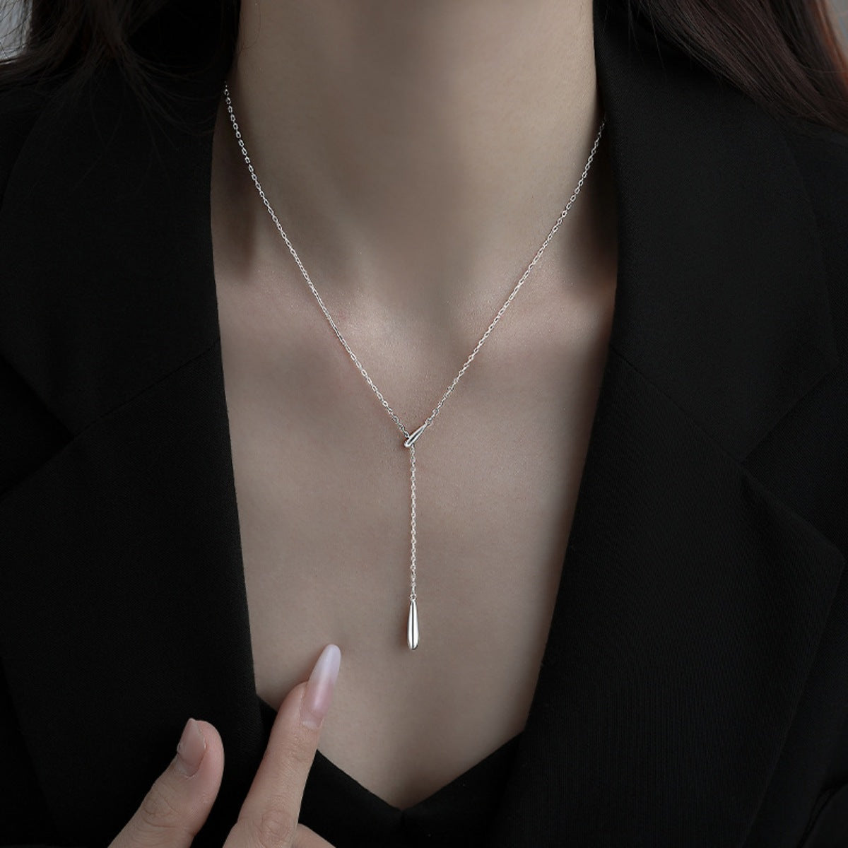 Silver Y-shaped pendant necklace with a single drop charm, 18k gold-plated.
