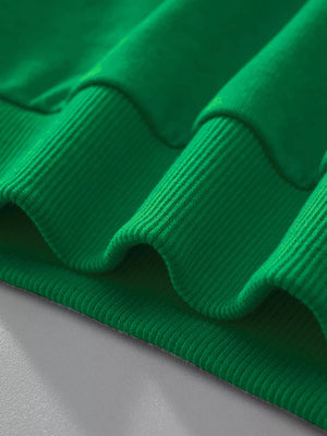 Dark green baby sweatshirt with ribbed cuffs and hem detail.