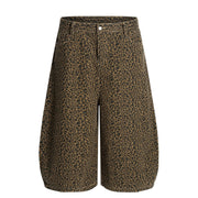 Men's brown leopard print wide-leg capris with a relaxed fit.