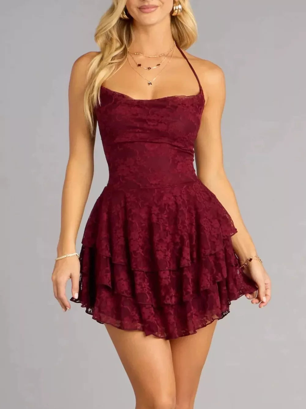 Burgundy lace halter neck mini dress with tiered ruffle skirt