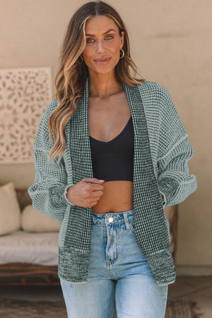 Textured open-front knit cardigan in Gum Leaf with contrasting panels and relaxed fit.