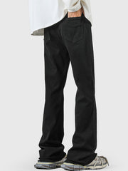 Men's black 100% cotton flare jeans with raw hem detail.