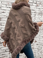 Mocha cable knit poncho with faux fur trim and open knit detail.