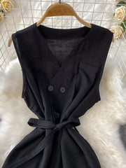 Black V-neck sleeveless belted wide leg jumpsuit with double-button detail