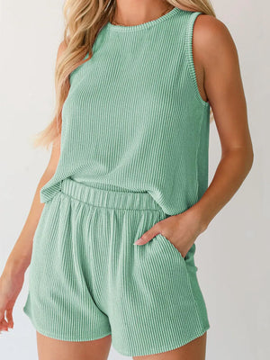 Sleeveless ribbed knit coord set in Gum Leaf green with elastic waist shorts.