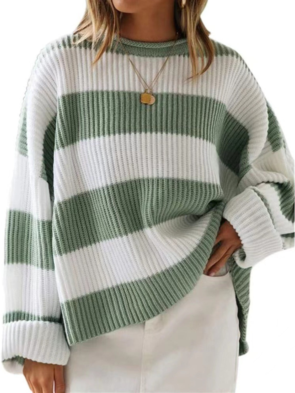 Striped oversized knit sweater in Sage and white with crew neck and long sleeves.