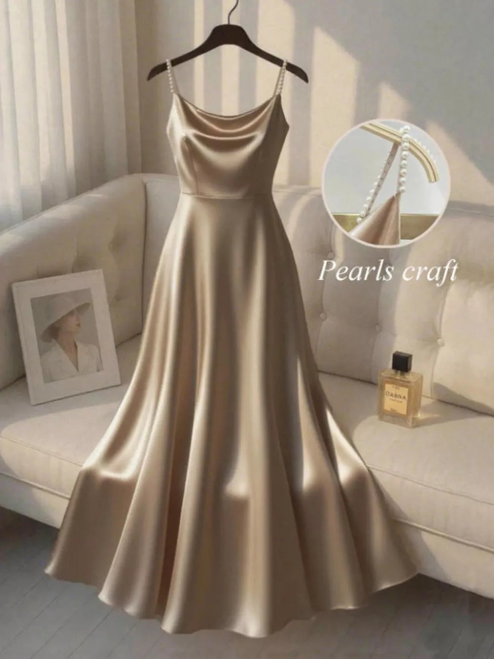 Apricot satin cami dress with pearl-embellished straps and cowl neck.