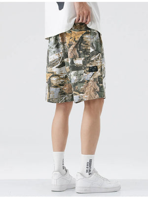 Men's camouflage pattern trunks in Khaki with side pockets and a relaxed fit.