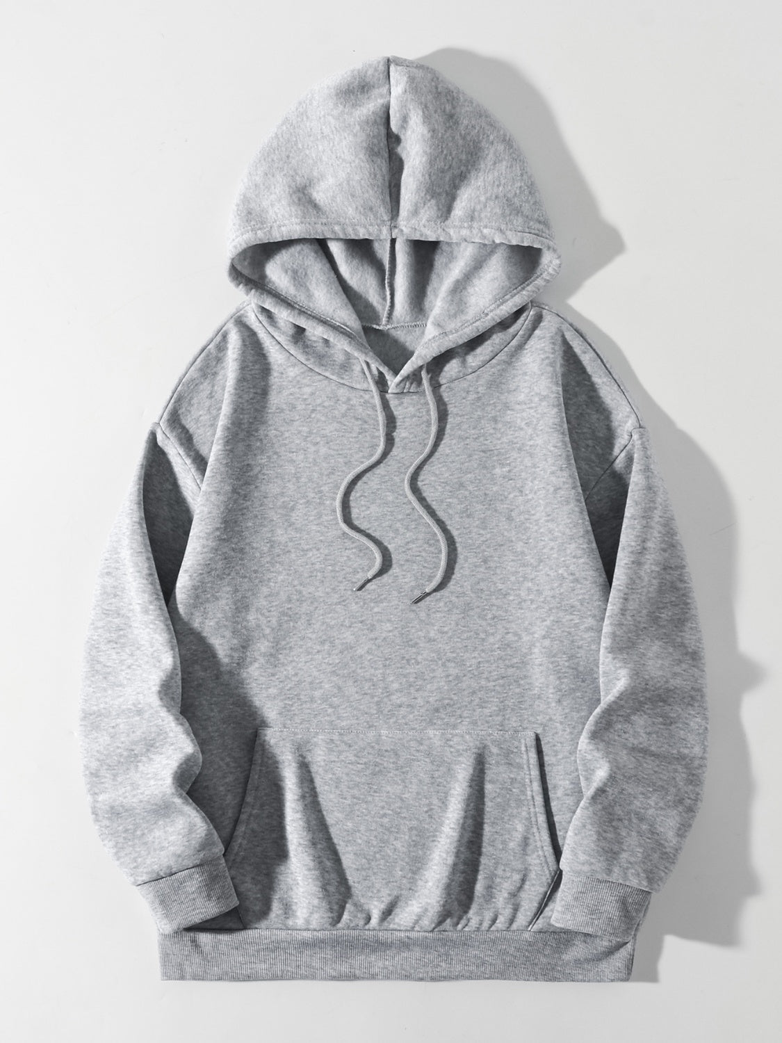 Gray oversized hoodie with pouch pocket and drawstring hood