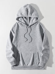 Gray oversized hoodie with pouch pocket and drawstring hood