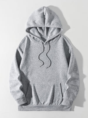 Gray oversized hoodie with pouch pocket and drawstring hood