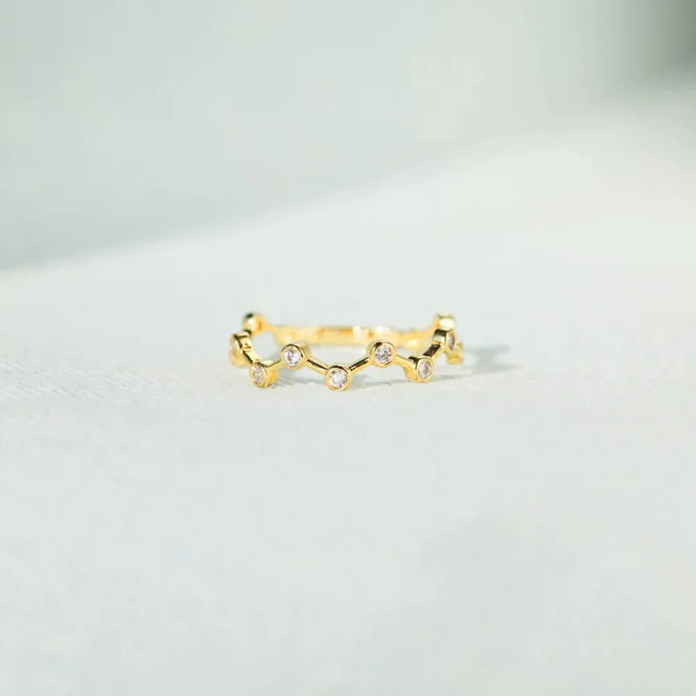 Gold celestial wave ring with clear zirconia stones