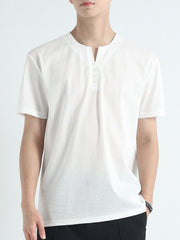 Men's white cotton short sleeve henley t-shirt with button placket.