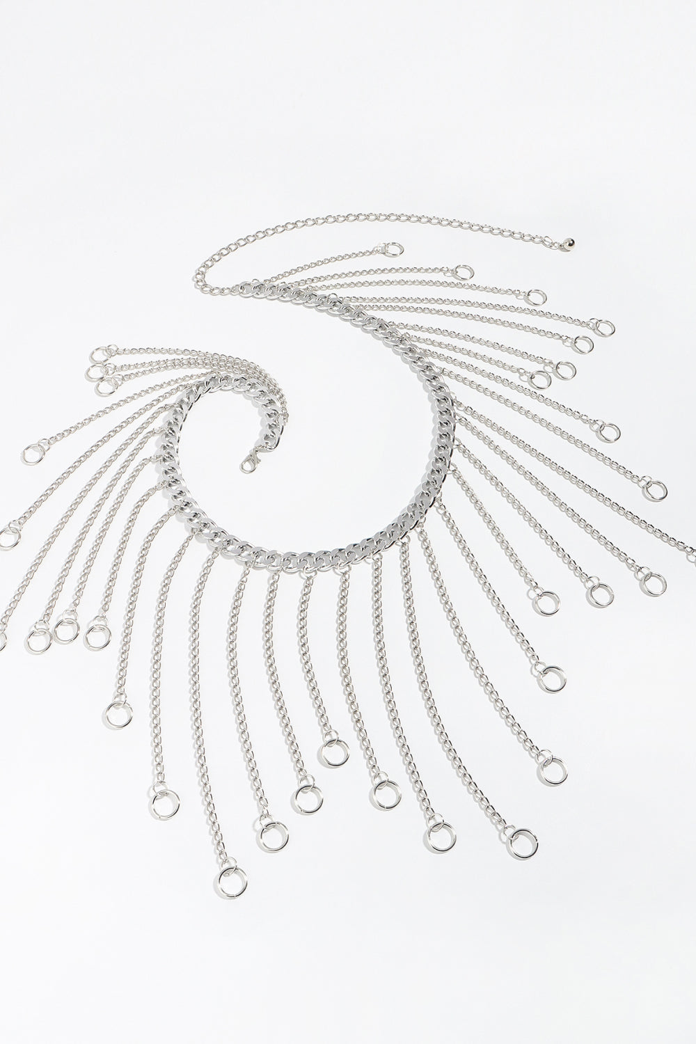 Silver chainmail belt with cascading chain fringe and ring details.