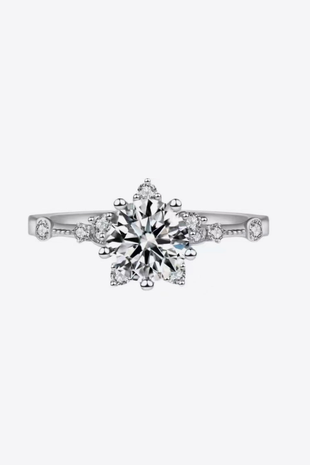 Silver halo ring with floral diamond design, 18K gold-plated.