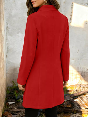 Chic longline trench coat in Scarlet with button-down detail and classic collar.