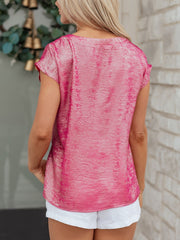 Hot pink metallic tee with cap sleeves and round neck, made of polyester and spandex.