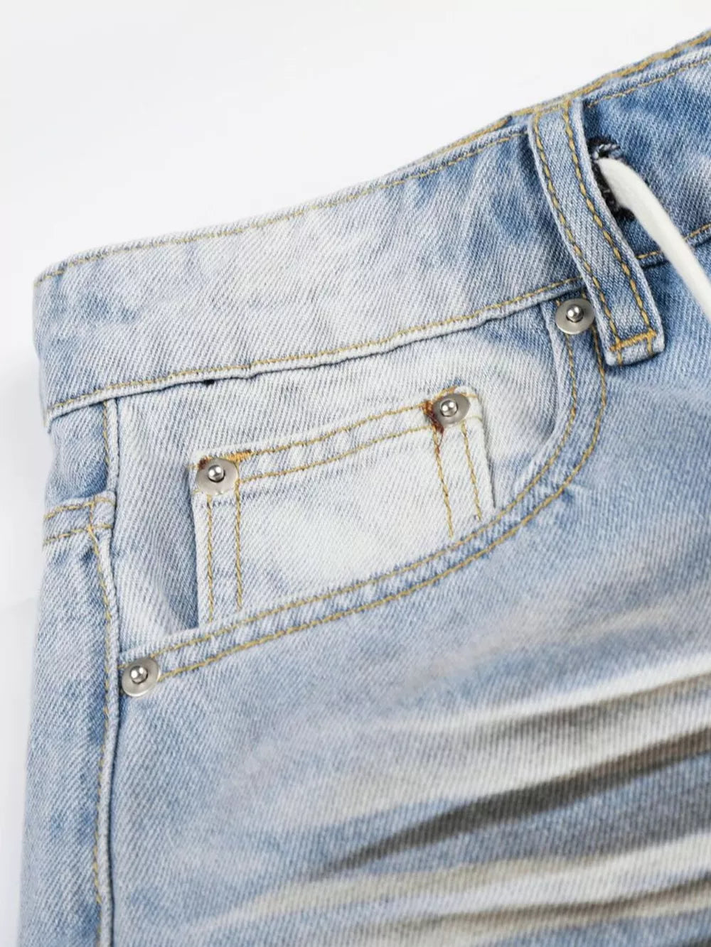 Light blue distressed wide-leg capri jeans for men with drawstring detail.
