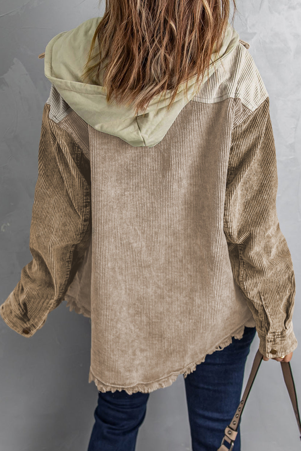 Colorblock corduroy hooded utility jacket in tan and sage with frayed hem.