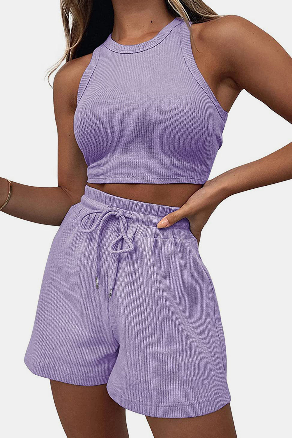 Lavender ribbed knit crop top and drawstring shorts set with a racerback neckline.