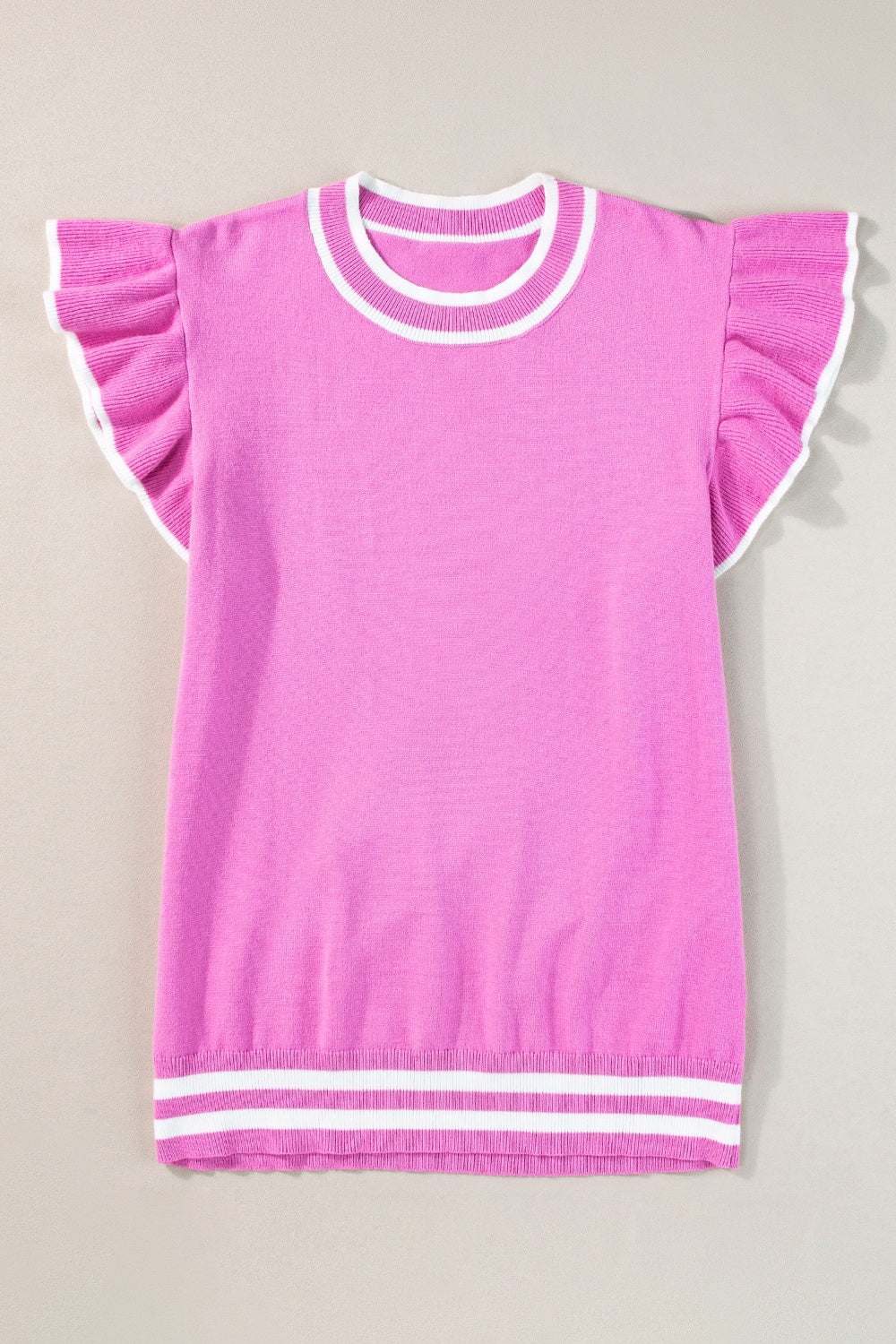 Fuchsia pink knit top with ruffled sleeves and contrast trim neckline and hem