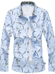 Men's light blue cotton button-down shirt with abstract print and patterned collar.