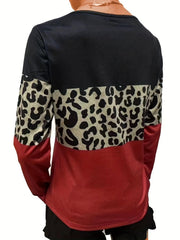 Long sleeve top with black, leopard print, and deep red color blocking.