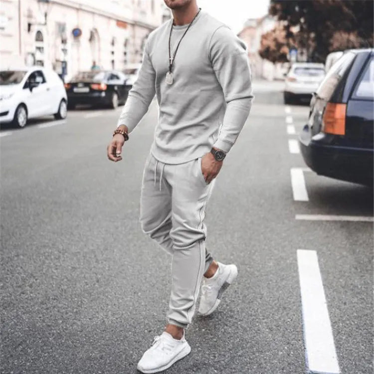 Men's gray textured loungewear set with crewneck sweatshirt and drawstring joggers