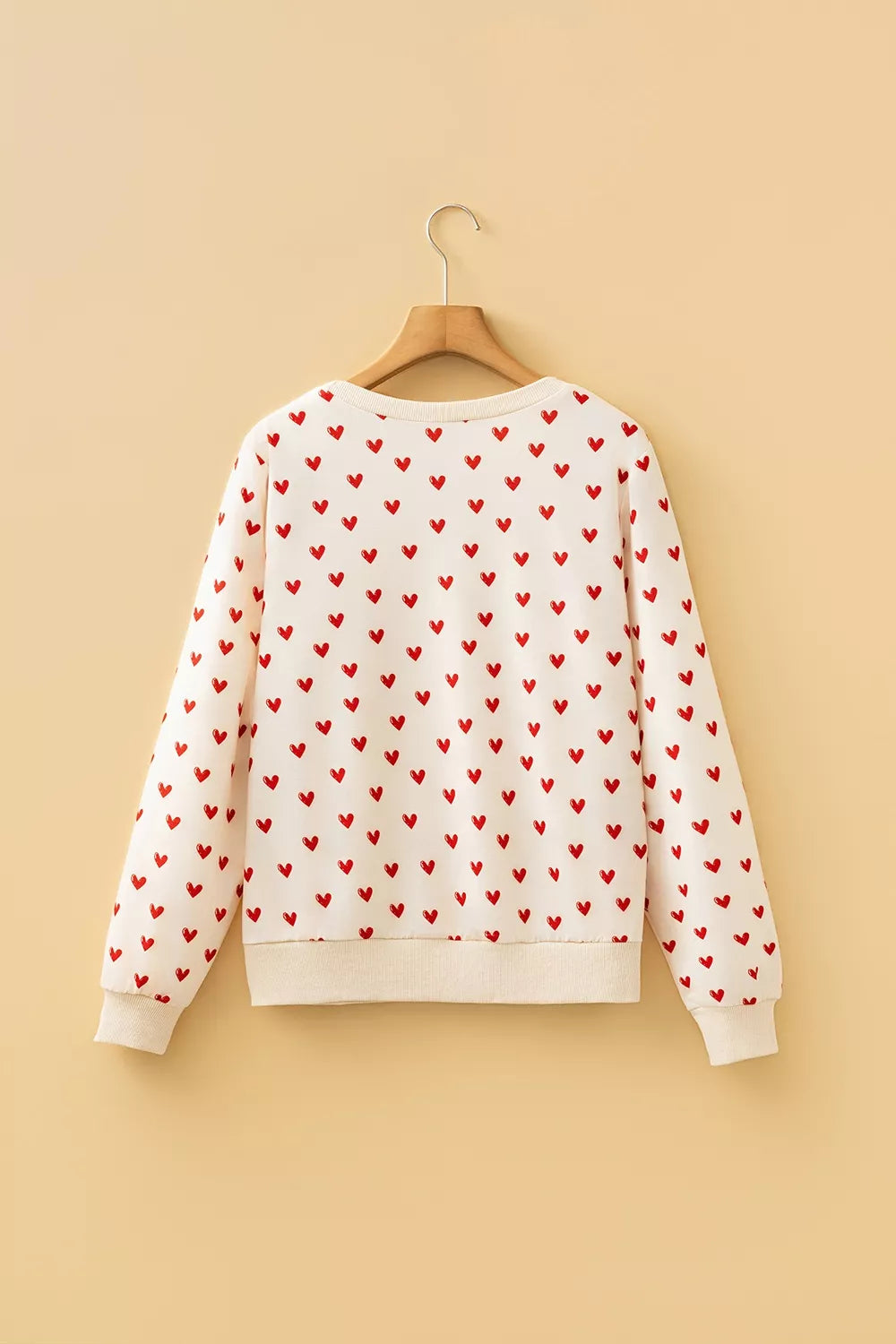 Heart Print Round Neck Long Sleeve Sweatshirt in Cream, close-up detail