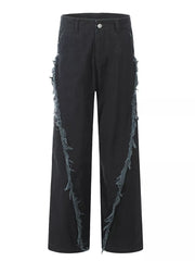 Black wide-leg sweatpants with distressed fringe detail on the sides