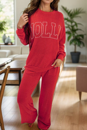 Deep Red ribbed knit lounge set with "JOLLY" graphic sweatshirt and wide-leg pants.