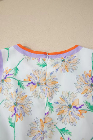 Floral print sleeveless dress with purple and orange trim and a zipper closure.