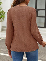 Brown perforated puff sleeve blouse with allover diamond pattern