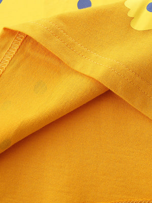 Yellow cotton toddler t-shirt with blue polka dot and leopard graphic detail.