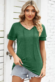 Dark green flutter sleeve henley tee with tie neckline and layered short sleeves.