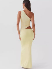 Yellow one-shoulder cutout maxi dress with ruched detail and a cutout at the waist.