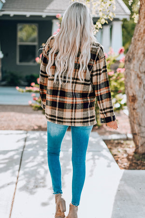 Soft plaid shacket with buttoned front and patch pockets, in tan and black plaid.