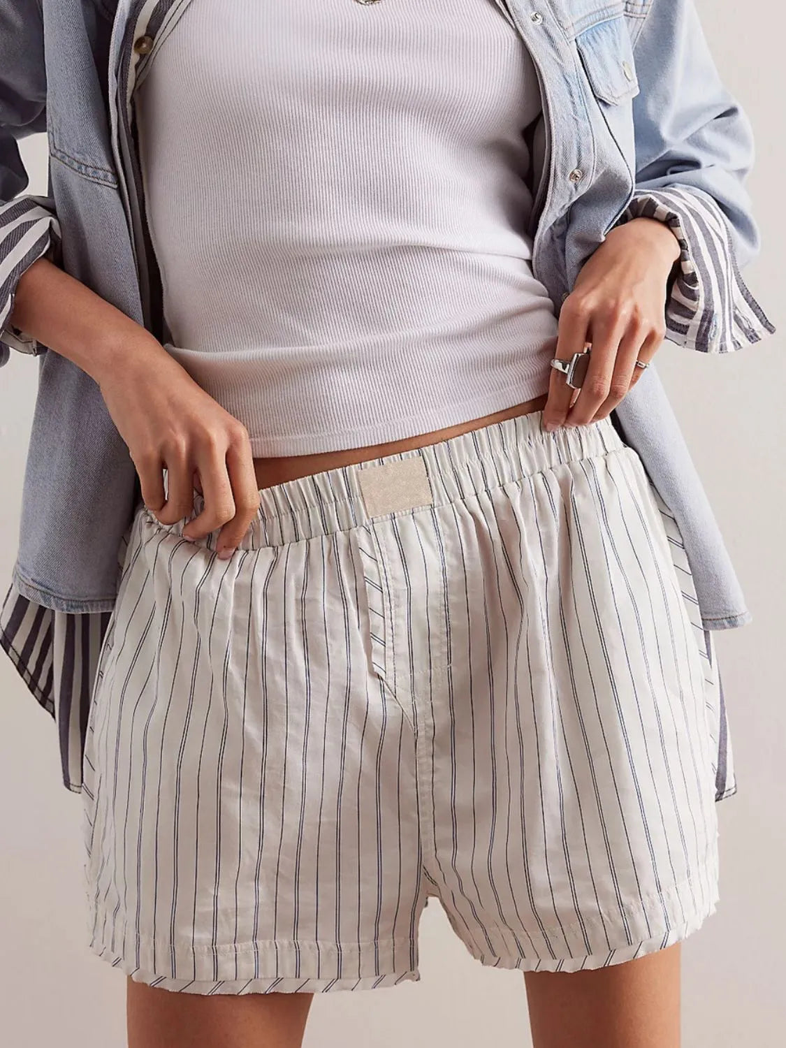 Sky Stripe Boxer Shorts in white with navy pinstripes, elastic waistband, and breathable fabric.